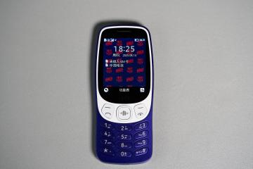 虎扑首页-HMD3210巴塞罗那定制版上手：功能机都带 AI 助手了？